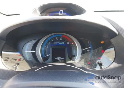 2010 Honda Insight Ex z USA, uszkodzony, nr VIN JHMZE2H75AS016902